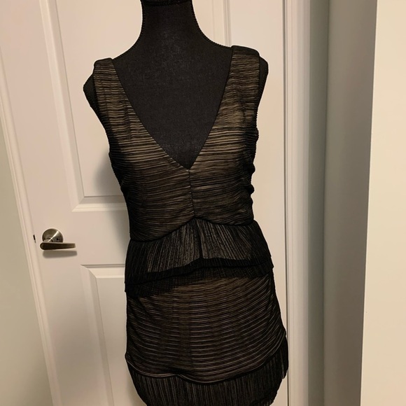BCBG black dress in size Medium. Place offer I will defently consider Thanks. - Picture 5 of 10